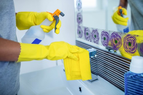 Local post-construction cleaning team working in a Battersea apartment
